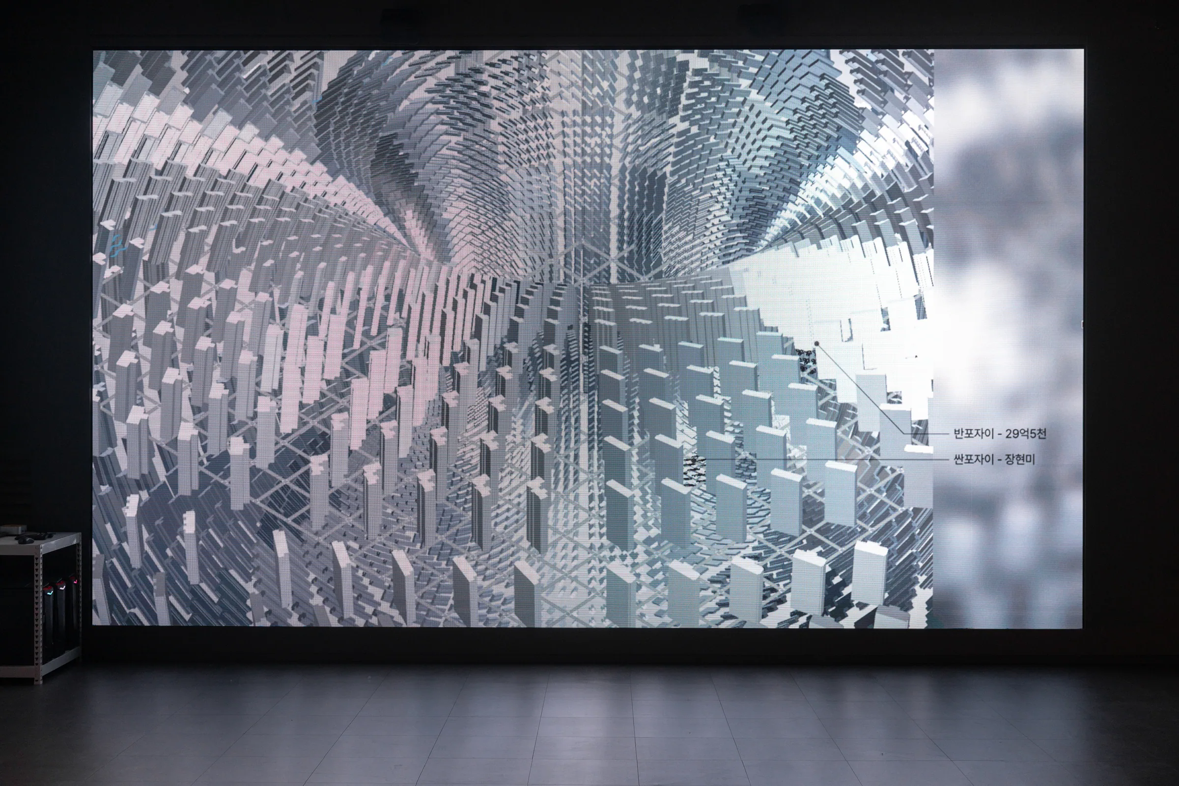 Jeanyoon Choi, ∫ (Banpo-Xism) (2026) — the apartment grid integrates across higher dimensions; advertising labels scatter across it.